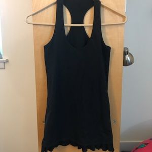 Lululemon ruffled hem black tank. Size 6.